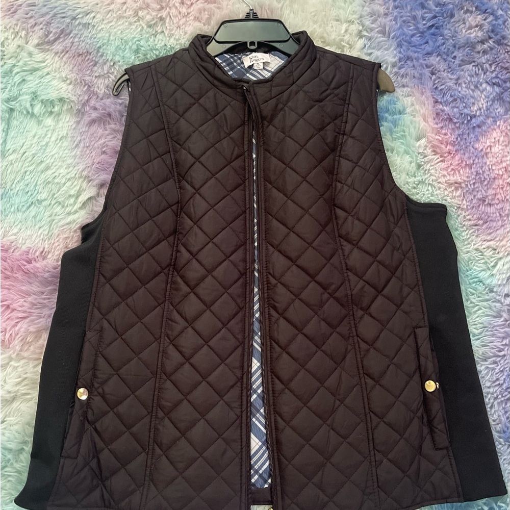 Kim Rogers black vest